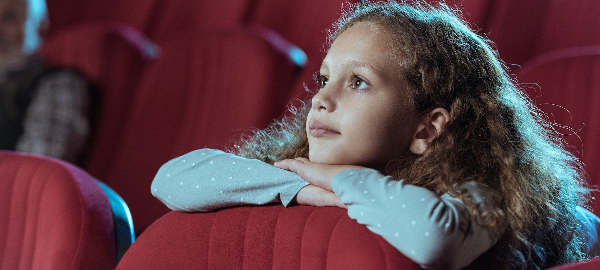 Child watches a film spellbound